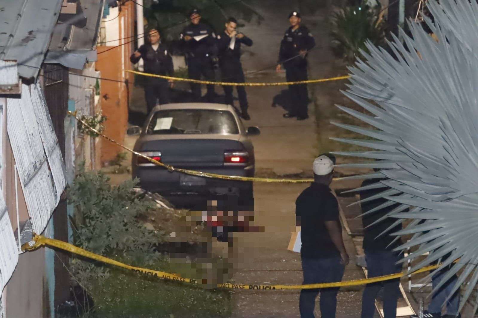 Escena del homicidio en la calle-vereda en Santa Librada. (Foto-Video: Alexander Santamaría)