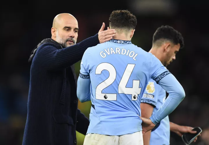 Pep Guardiola (L) y Josko Guardiol. /Foto: EFE